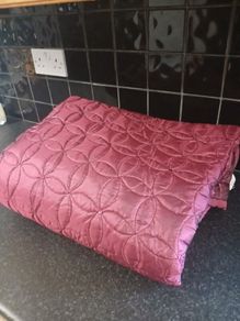 bed or couch throws, wine color and a reversible brown/teal colours