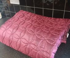 bed or couch throws, wine color and a reversible brown/teal colours