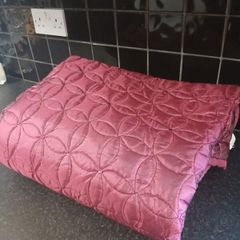 bed or couch throws, wine color and a reversible brown/teal colours