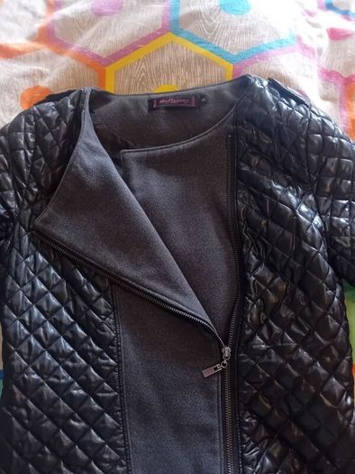 ladies jacket. Padded design. Black with grey material. Size small