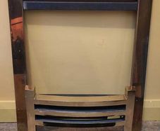 Brass effect gas fire surround