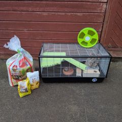 hamster cage and unopened food