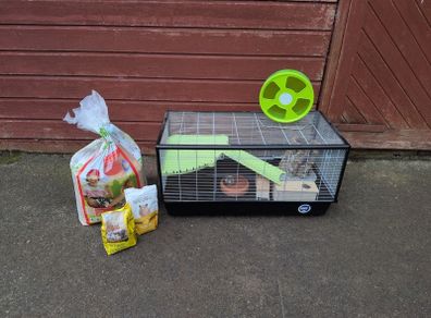 hamster cage and unopened food