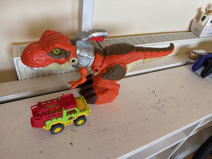 Dinosaur Toy with Car Swallows Objects and Opens Mouth Santry