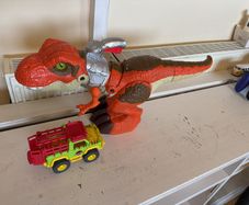 Dinosaur Toy with Car Swallows Objects and Opens Mouth Santry
