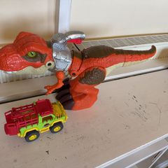 Dinosaur Toy with Car Swallows Objects and Opens Mouth Santry