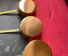 Vintage mini copper saucepans