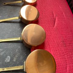 Vintage mini copper saucepans