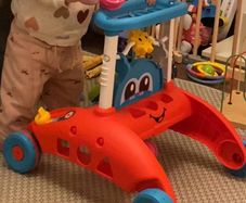 Fisher-Price 2-Sided Steady Speed Baby Walker with Songs and Phrases