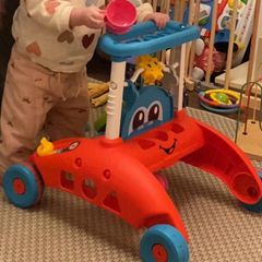 Fisher-Price 2-Sided Steady Speed Baby Walker with Songs and Phrases