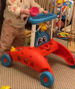 Fisher-Price 2-Sided Steady Speed Baby Walker with Songs and Phrases