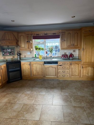 Maple Kitchen with Velstone Worktops  2,000 ono