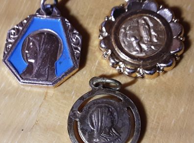 three yellow metal religious medals (m), tub 3