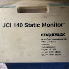 This is a JCI 140 Static Monitor kit by Stat Attack (Amersham International plc), designed to measure surface static voltage in industrial, electronic, or laboratory environments.