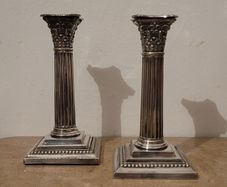 Antique pair of silverplate corinthian column candlesticks