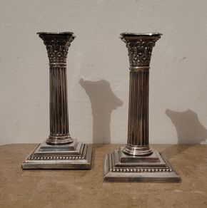 Antique pair of silverplate corinthian column candlesticks