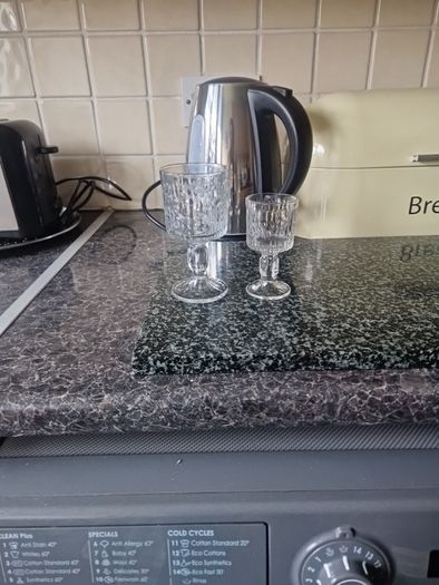 6 medium and 8 small wine glasses