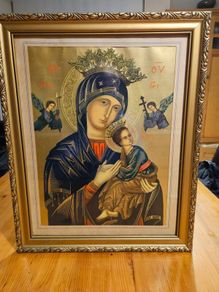 Our Lady of Perpetual Help (also known as Our Lady of Perpetual Succour), a classic Byzantine Catholic icon depicting the Virgin Mary holding the Christ Child. Quality gold lithograph framed in large guilded frame. 20 1/2" Heigh x 16 1/2" wide.