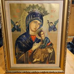 Our Lady of Perpetual Help (also known as Our Lady of Perpetual Succour), a classic Byzantine Catholic icon depicting the Virgin Mary holding the Christ Child. Quality gold lithograph framed in large guilded frame. 20 1/2" Heigh x 16 1/2" wide.