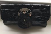 Ladies patent clutch bag