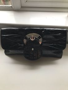 Ladies patent clutch bag