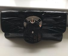 Ladies patent clutch bag