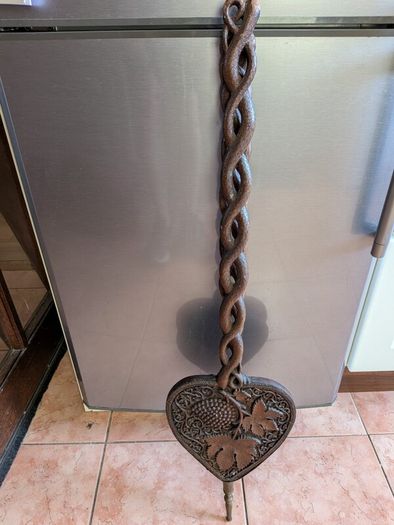 antique ornate fire bellow
