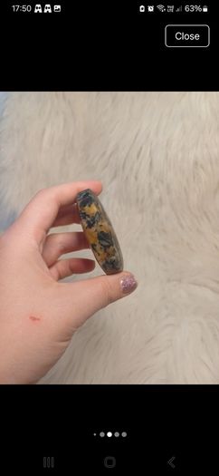 black and yellow tourmaline in quartz palmstone