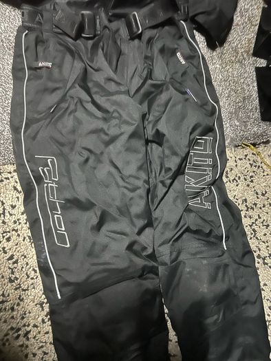 motorbike suit gloves and helmet