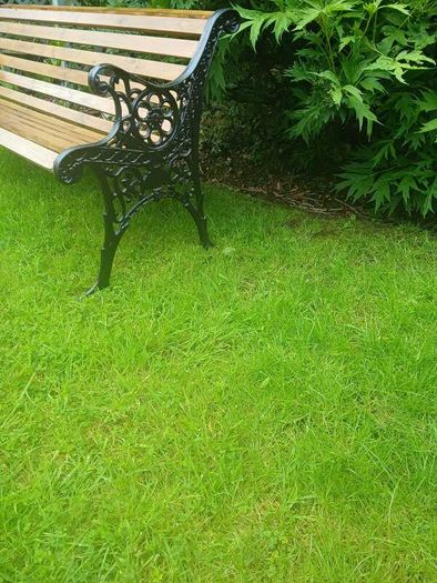 Cast iron and oak garden bench