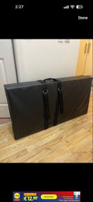 Folding gymnastics mat