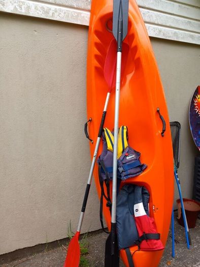 Kayak plus 2 paddles and 2 bouyancy aides