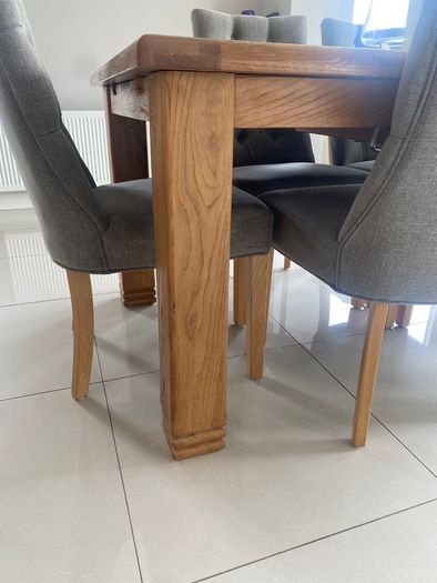 Solid oak dining table and chairs