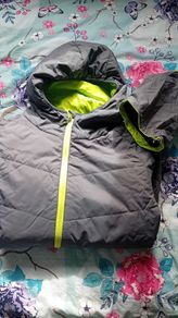 Padded jacket NEW and carrier pouch
