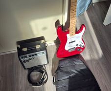 Squier stratocaster + amp and accessories
