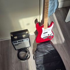 Squier stratocaster + amp and accessories