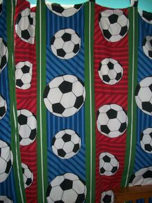 Boy bedding set with matching curtains.