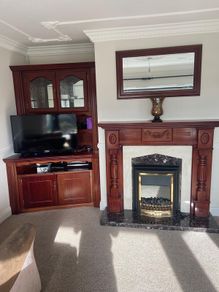 Mahogany cabinets, tv unit, fireplace