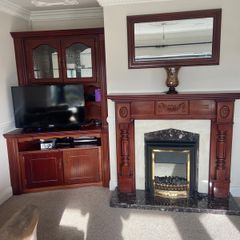 Mahogany cabinets, tv unit, fireplace