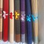Ten Multicoloured woven bamboo placemats. Image 6
