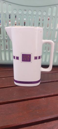 Silk Cut Purple advertising, water jug ,collectors item,,little chip on rim overall good,see pictures for condition, collectors item,,sold as seen