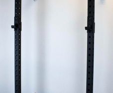 Wall mounted squat rack