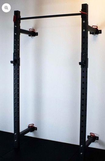 Wall mounted squat rack