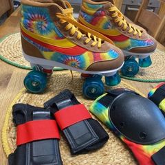 Skates and knee pads and wrist guards