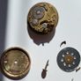Lot of Antique Watch Parts in Containers Image 10