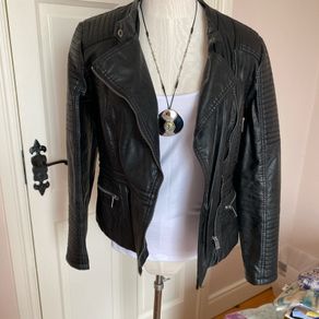 womans black leather jacket