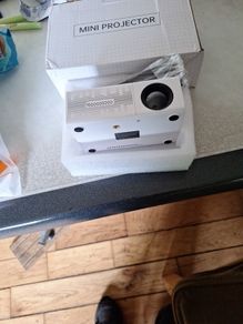 Mini Projector  New Plus Projector Screen