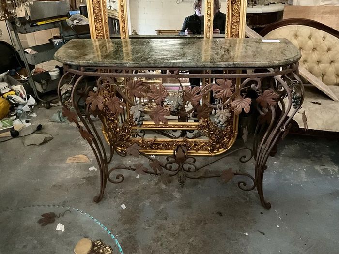 This is an old wrought iron, console table