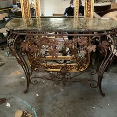 This is an old wrought iron, console table