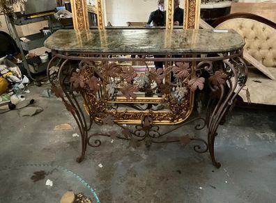 This is an old wrought iron, console table
